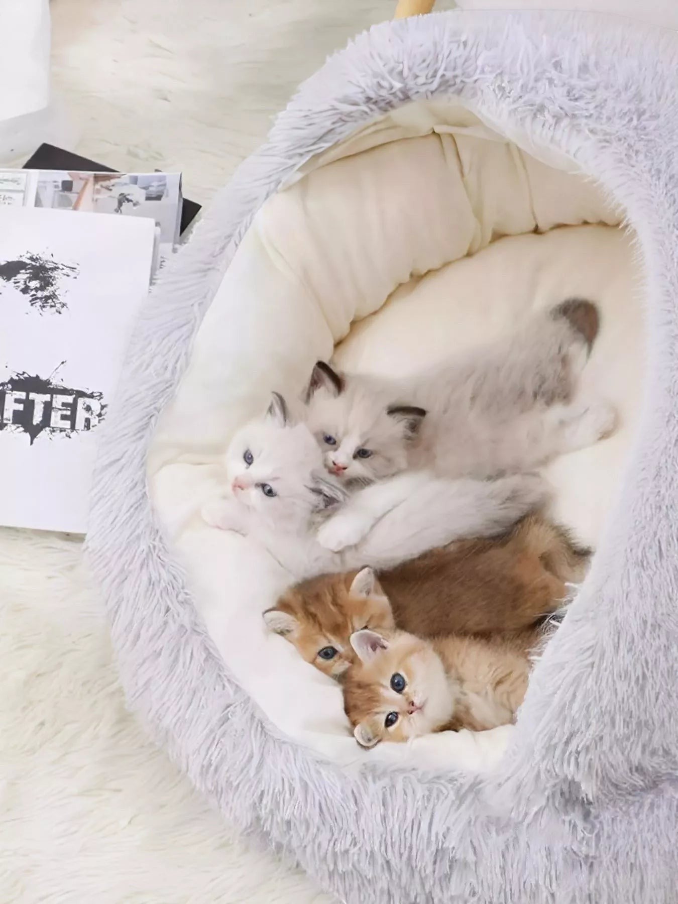 Little Pets Club Calming Cloud Nest pet bed in light gray faux fur with a deep nest shape, perfect for kittens and small pets.