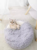 Little Pets Club Calming Cloud Nest plush grey pet bed with a light-colored cat resting inside.