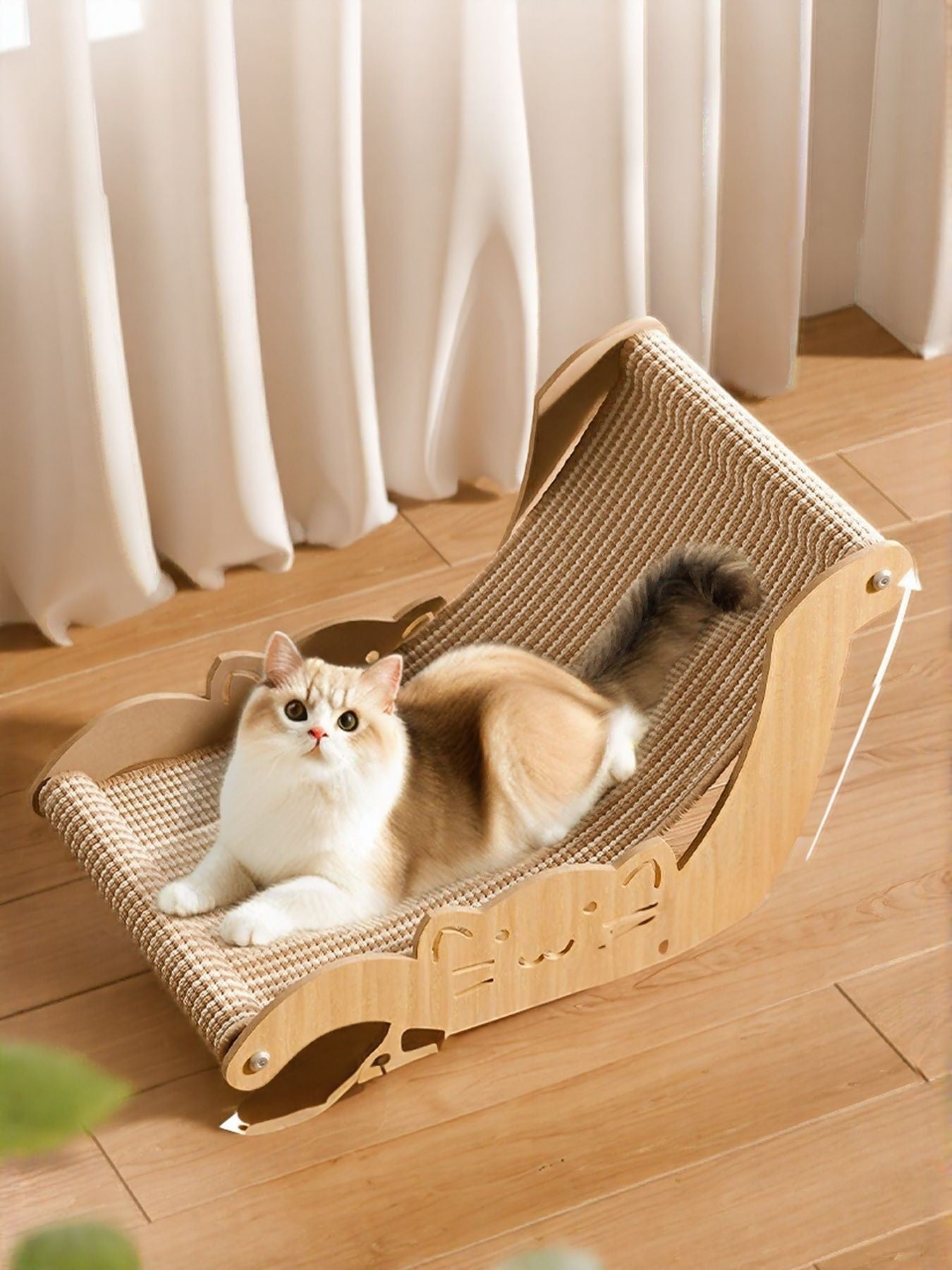 Little Pets Club wooden cat hammock with sisal scratcher. A fluffy cat lounges on the elevated bed.