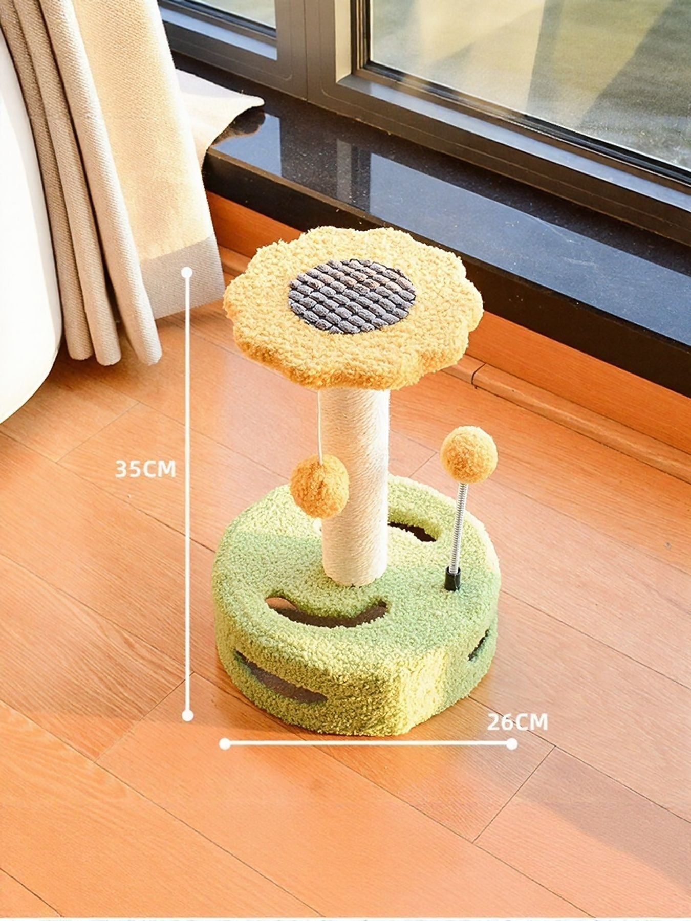 Little Pets Club Bloom Cat Scratcher with flower top, sisal post, and dangling pom balls on a plush green base.