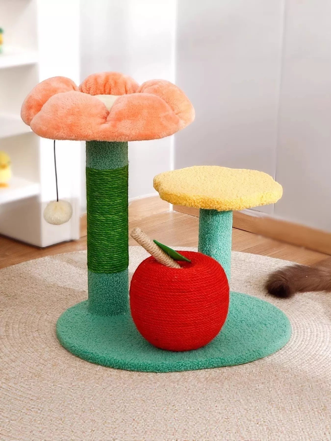 Little Pets Club Bloom Plush Cat Tree with flower-shaped perch, yellow perch, and apple scratcher. Features sisal posts and pom-pom toy.