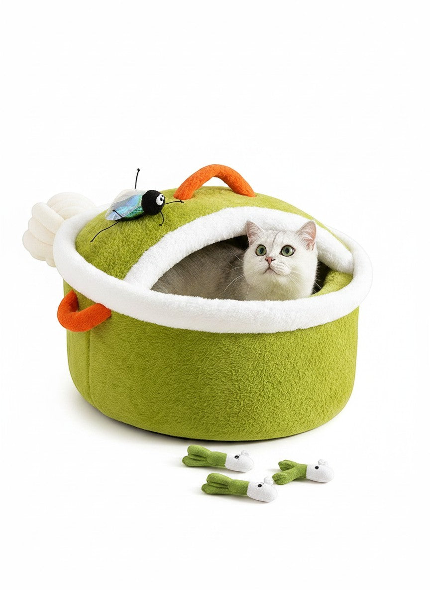The Cozy Critter Cave™ pet bed by little pets club is a green, plush, semi-enclosed hideout with orange handles and a toy bug.