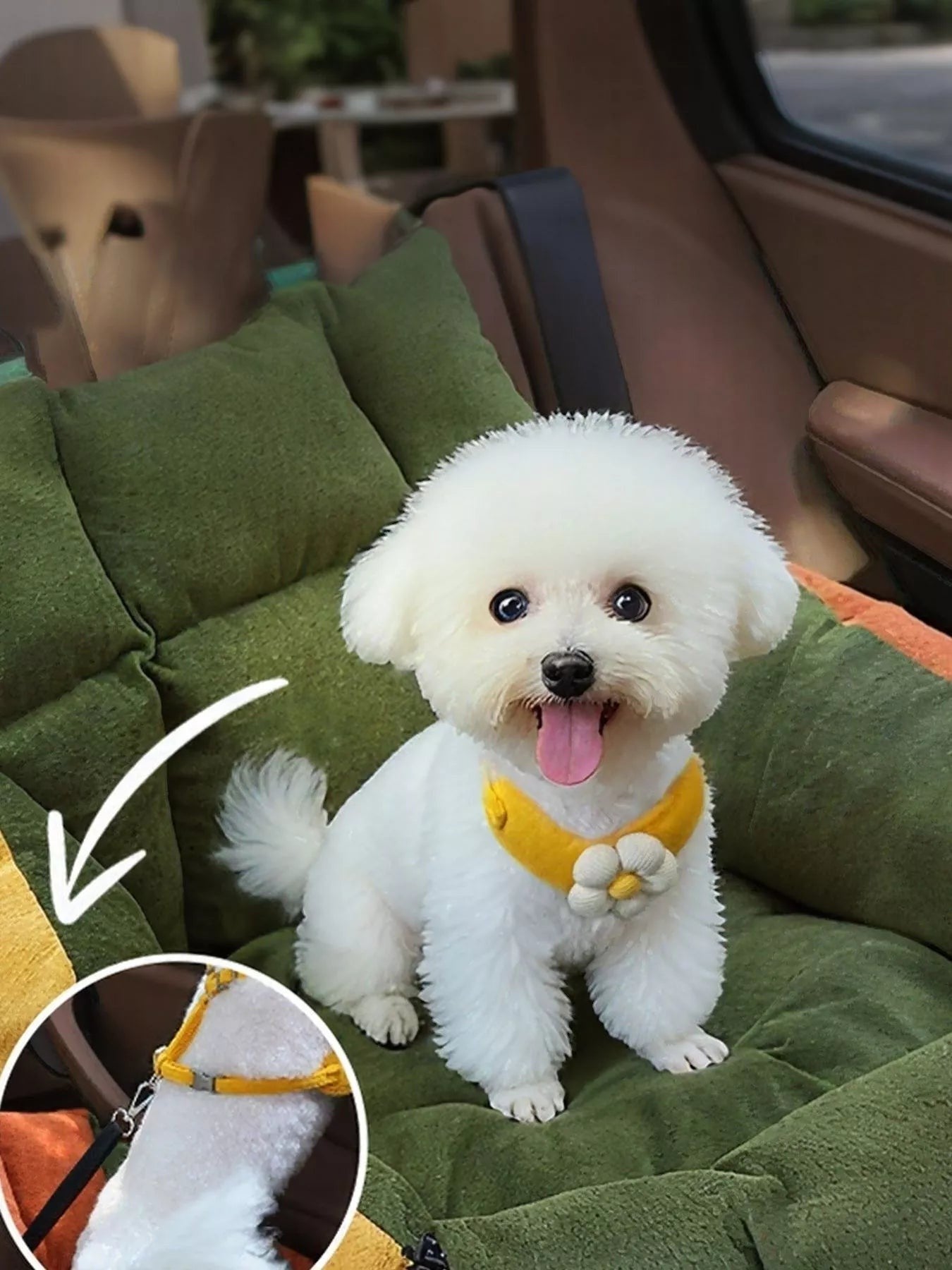Little Pets Club white Bichon Frise dog wearing a yellow flower harness sits in a green pet car seat bed.