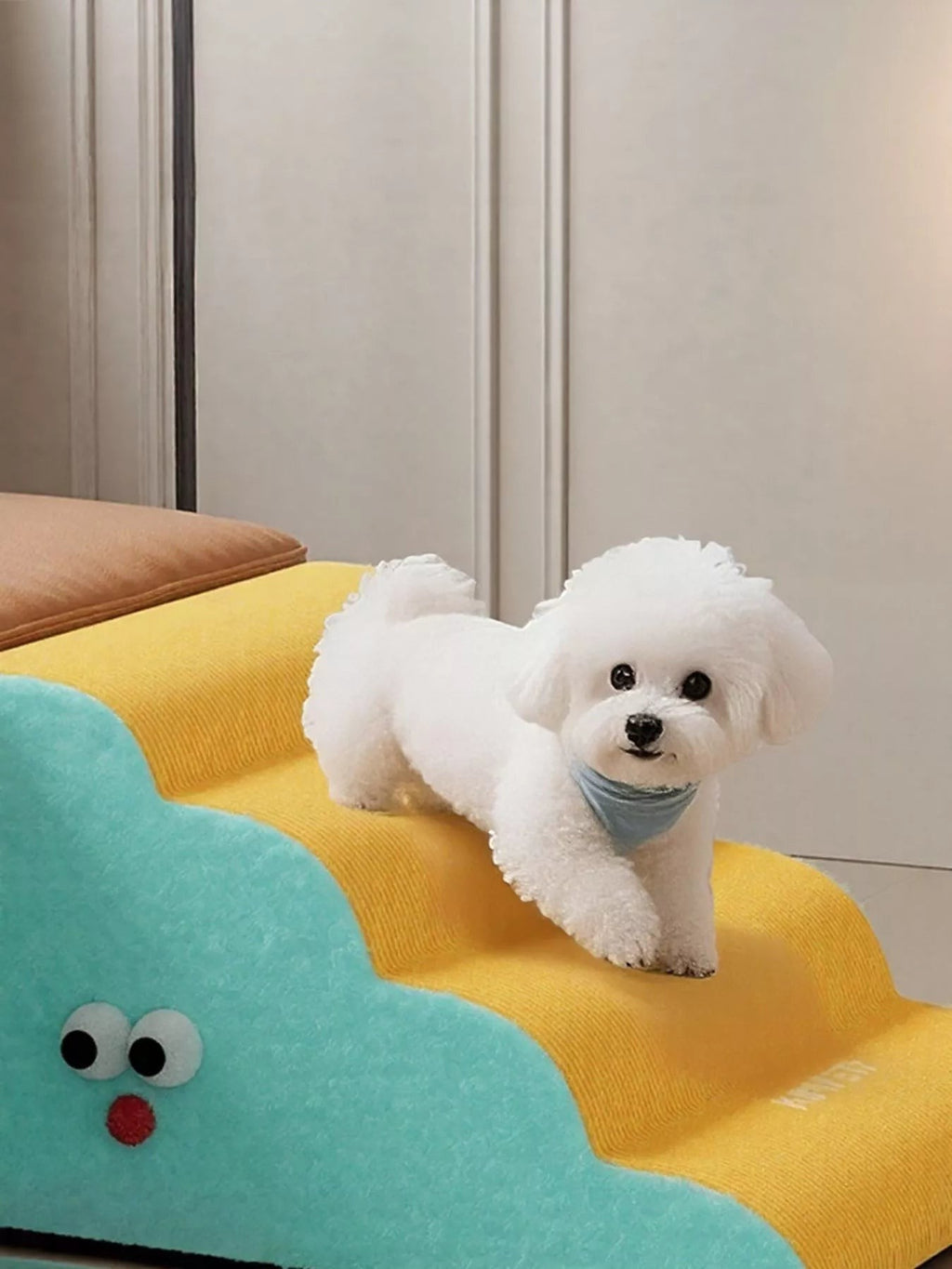 Little Pets Club soft foam pet stairs in blue and yellow with a white Bichon Frise dog wearing a blue bandana.