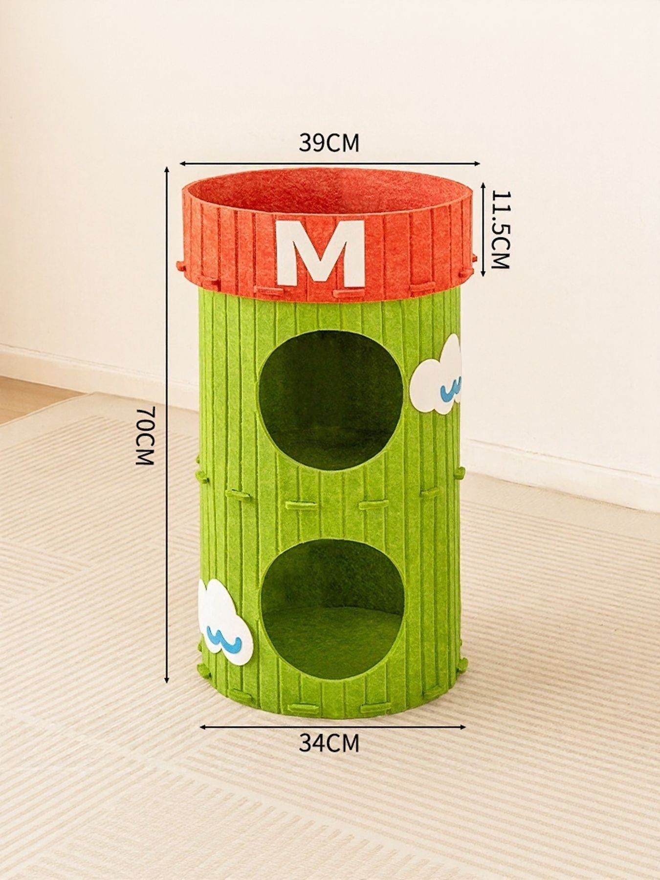 Little Pets Club green felt cat tower with two circular openings and a red top featuring the letter M. Cloud accents on the sides.