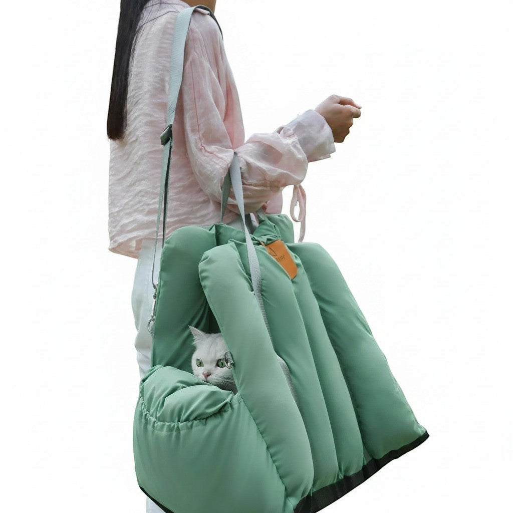 Little Pets Club sage green convertible pet travel tote and car seat carrier with plush interior, featuring a white cat.