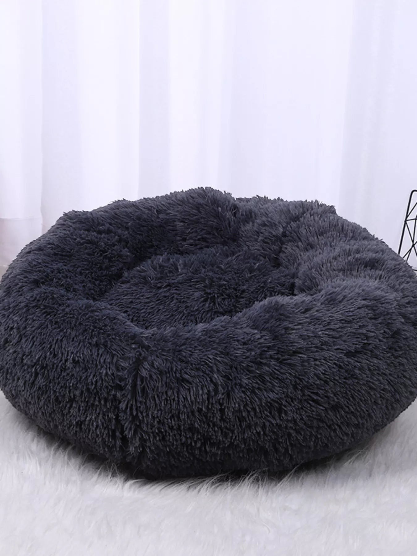 Little Pets Club dark grey plush donut pet bed with raised edges for comfort and security.