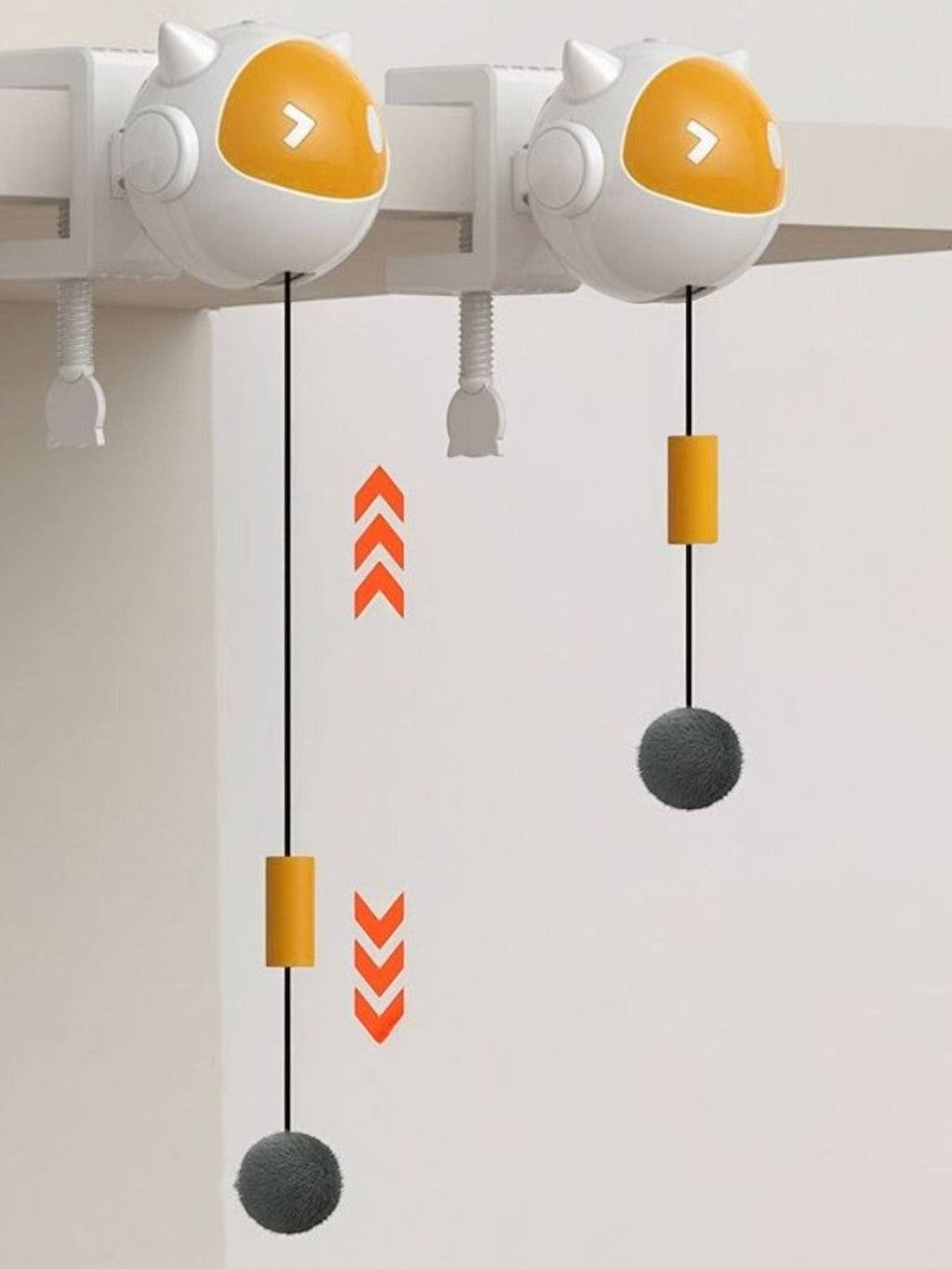 Little Pets Club interactive cat teaser toy with white and orange robot-like head, hanging grey ball, and ABS material.
