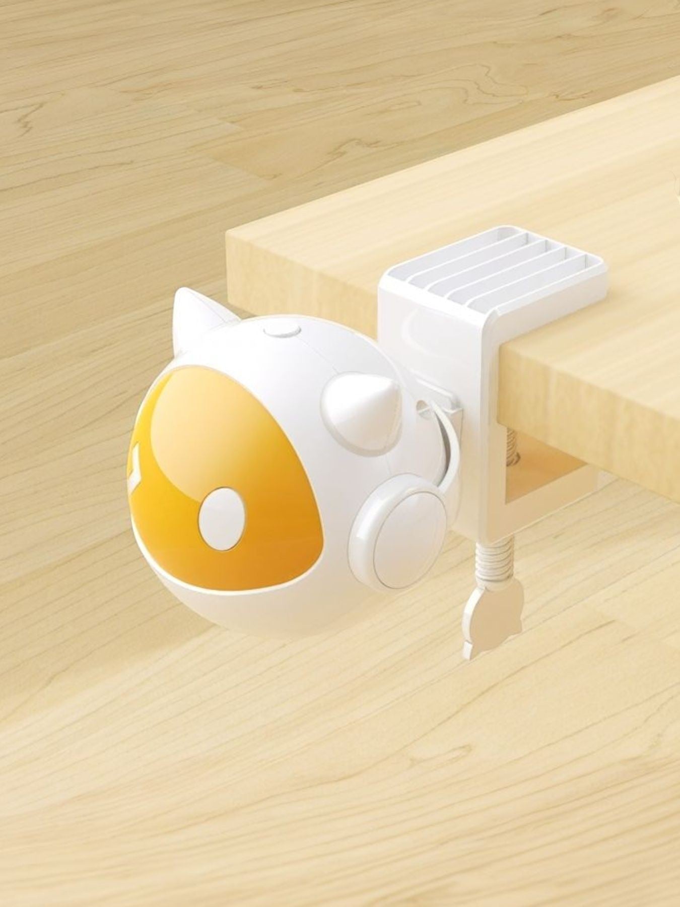 Little Pets Club white and yellow interactive cat teaser toy with ball, made of ABS, clamps to table edge.