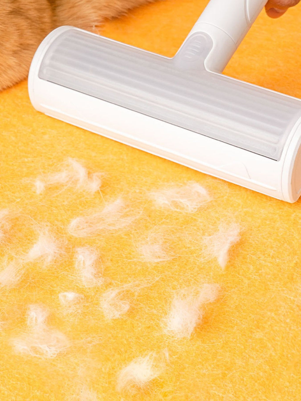 little pets club white pet hair remover roller cleaning orange fabric