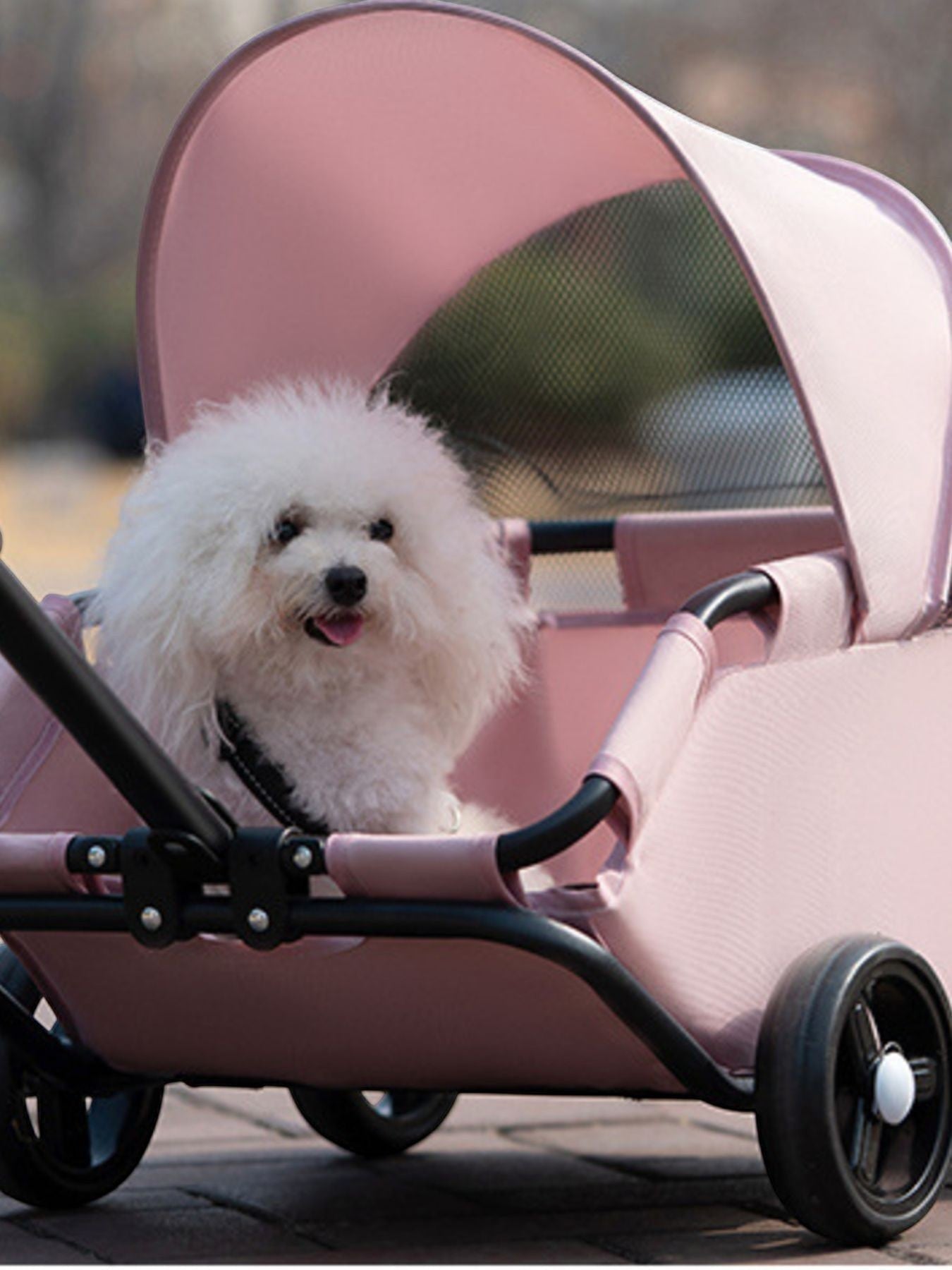 Little Pets Club pink pet stroller with a fluffy white dog inside, featuring a protective canopy and smooth-rolling wheels.