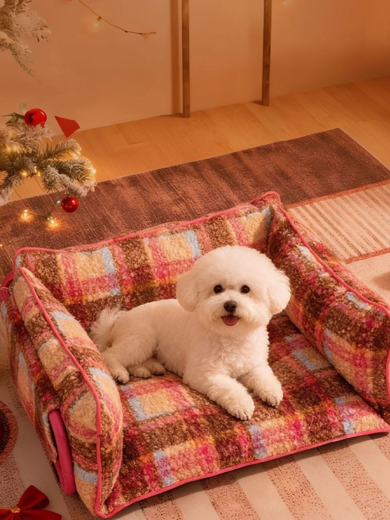 Little Pets Club cozy plaid dog sofa with raised sides and plush fabric. A white Bichon Frise rests on the bed.