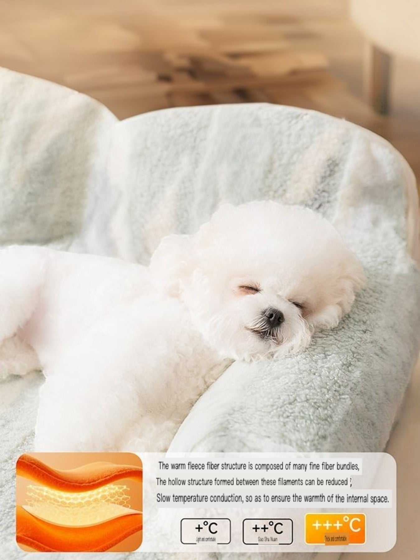 Little Pets Club light blue plush pet sofa bed with raised bolsters, a white dog sleeping comfortably on it.
