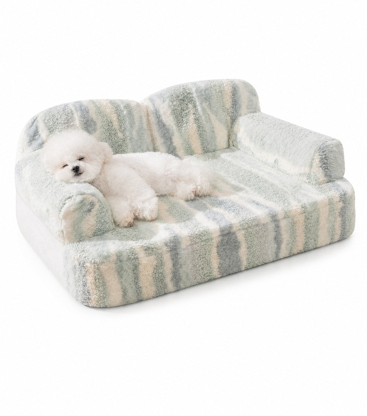 Little Pets Club plush pet sofa bed with raised bolsters and a white Bichon Frise dog resting on it. The bed has a striped pattern in blue, green, and cream.