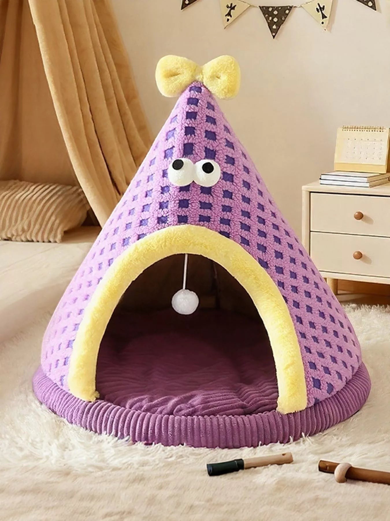 Little Pets Club purple plush cat tent bed with yellow trim, googly eyes, and a yellow bow. Features a dangling toy.