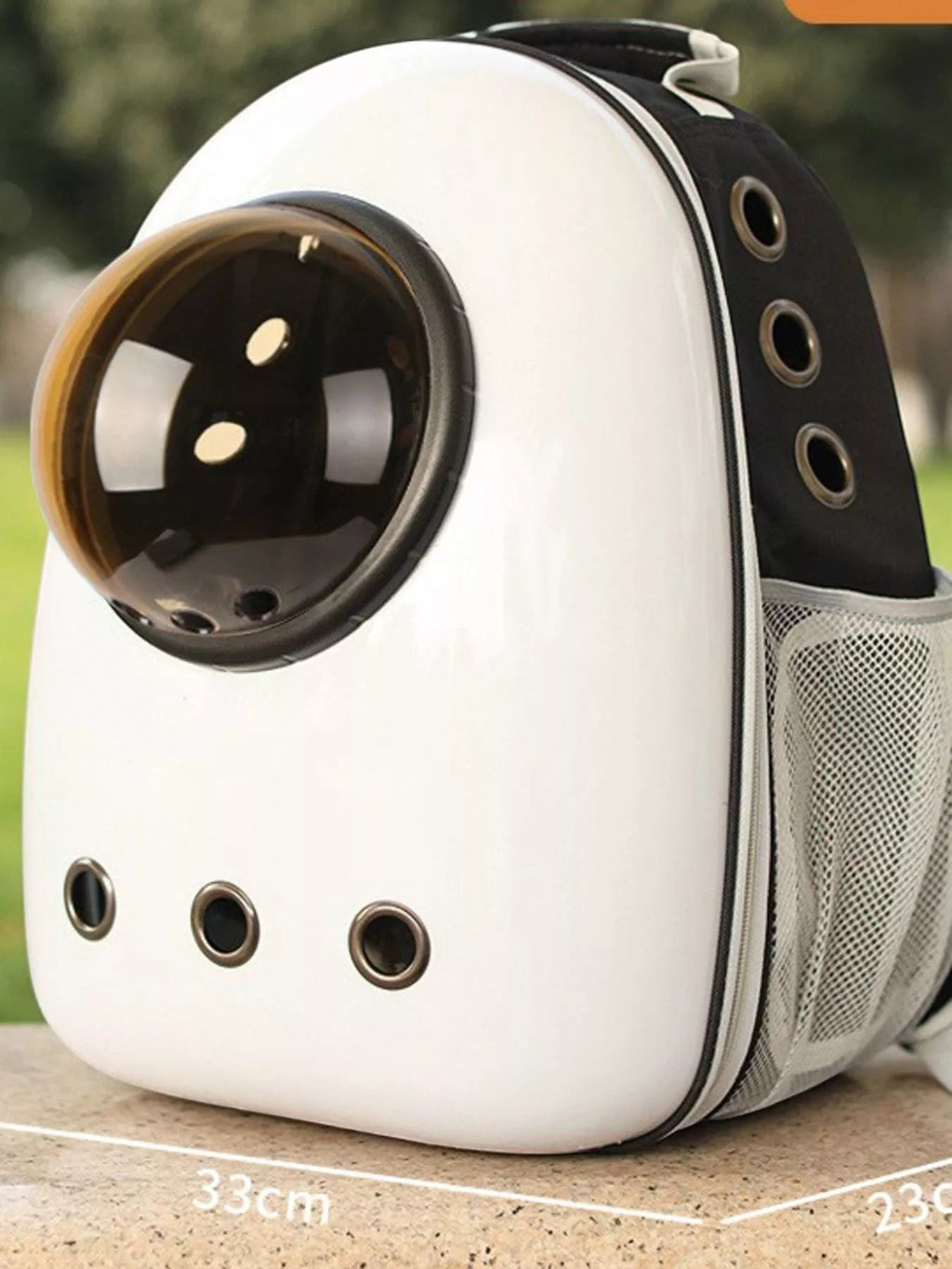 Little Pets Club white and black space capsule pet carrier backpack with transparent dome and mesh side pockets.