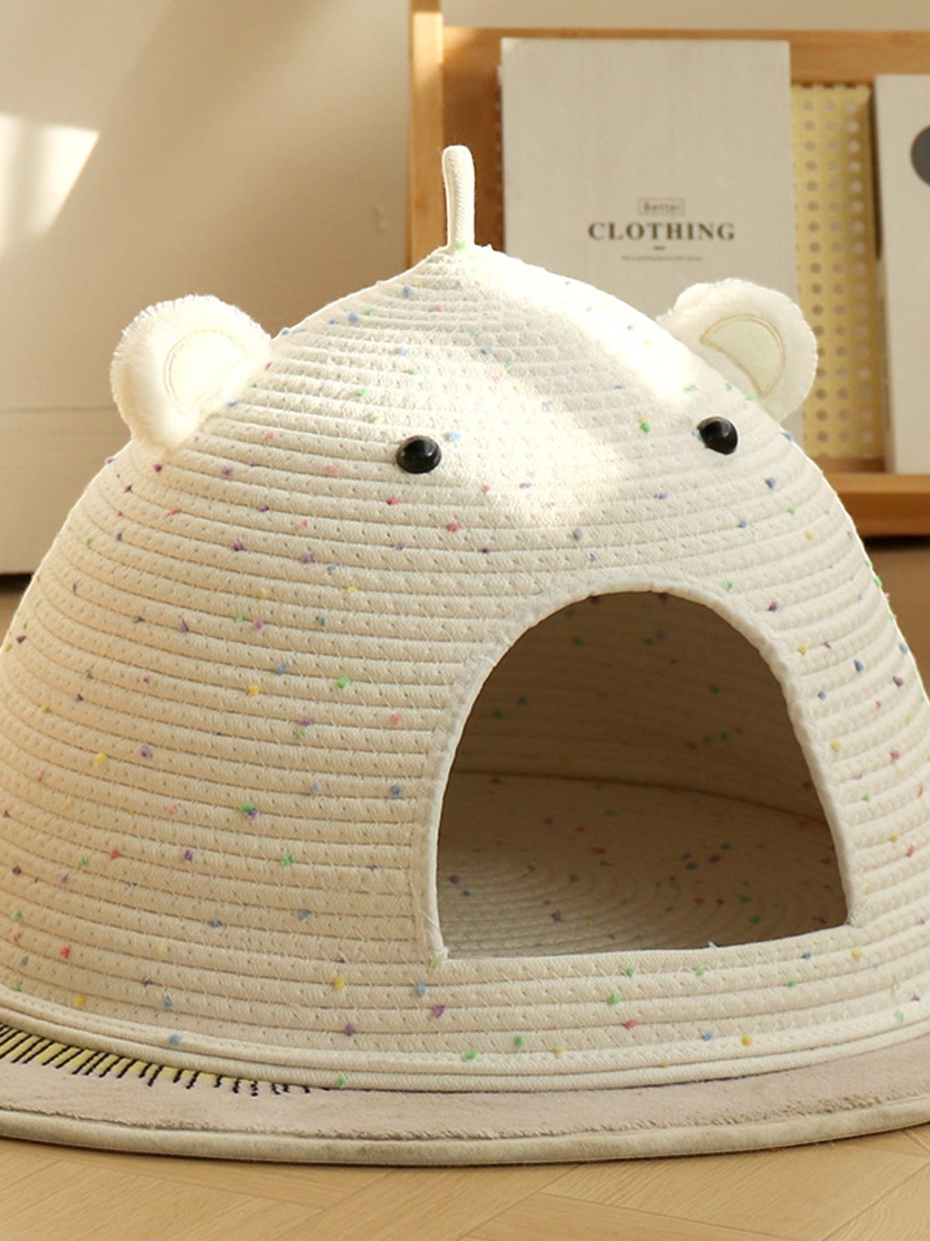 Little Pets Club speckled bear ear cat cave bed made of cotton rope with a semi-enclosed dome shape and multicolor speckles.
