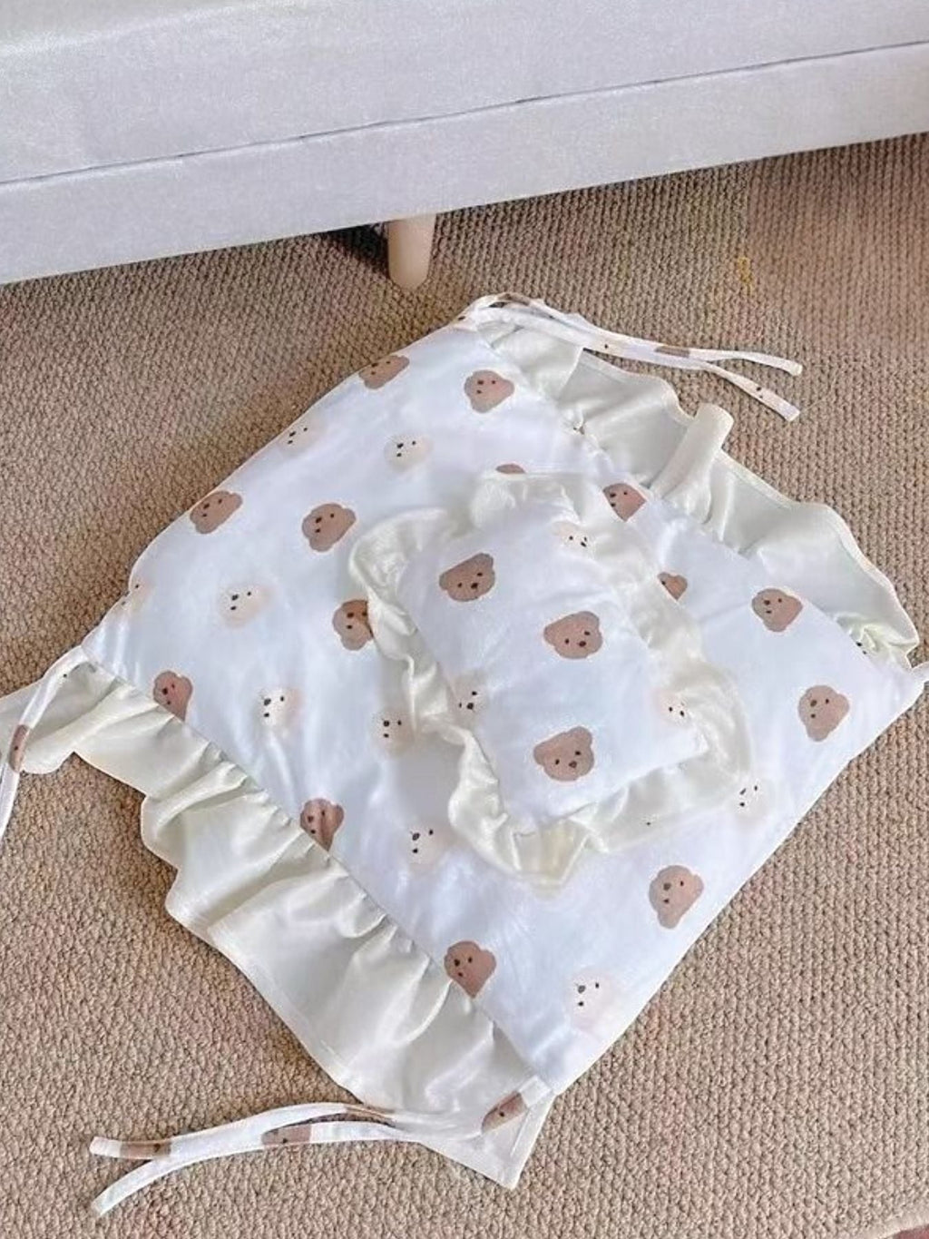Little Pets Club white pet bed with a cute teddy bear print and ruffled edges, includes a small matching pillow.