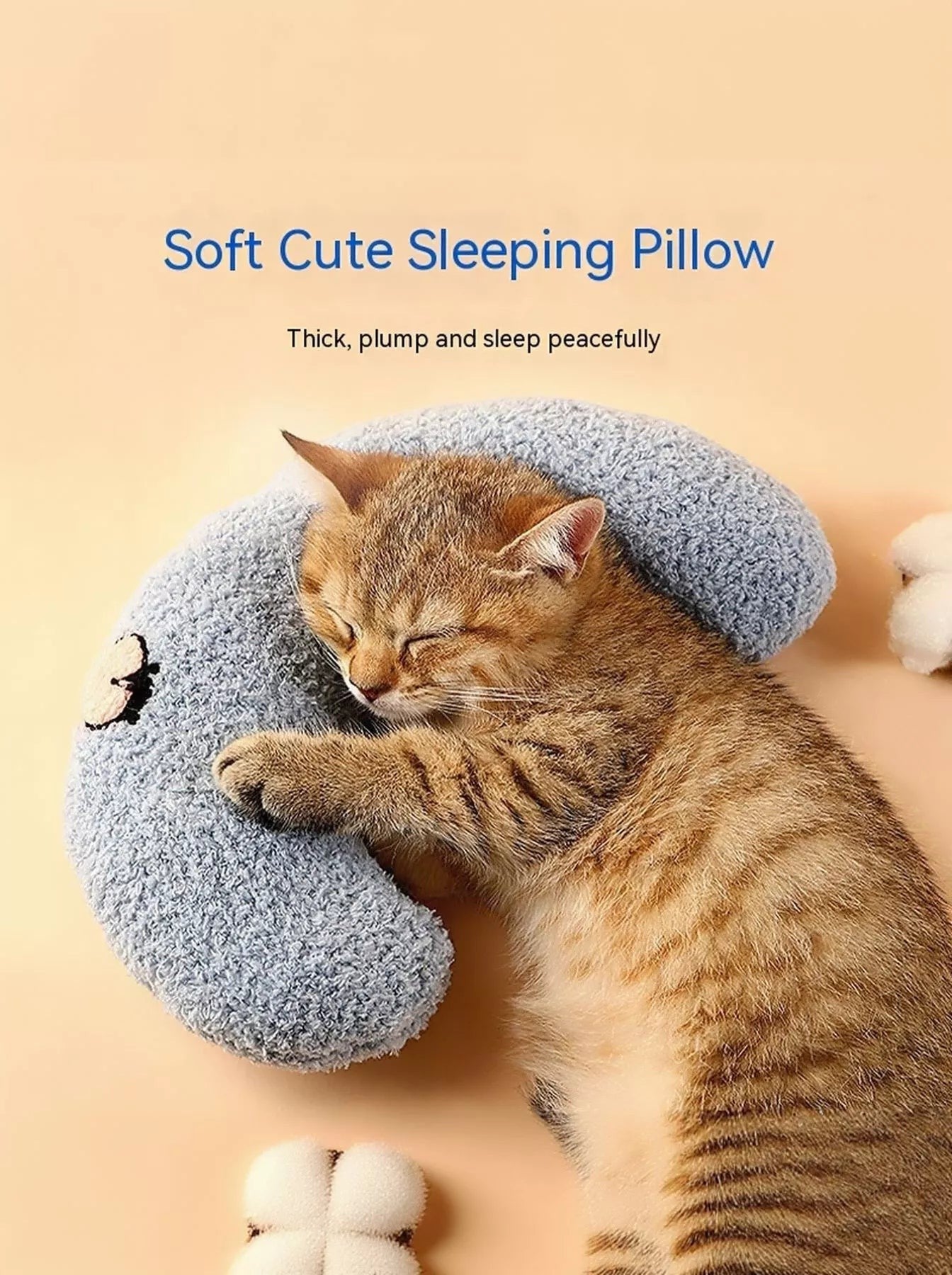 Little Pets Club light blue U-shaped plush pet nest with a tabby cat sleeping soundly on it.