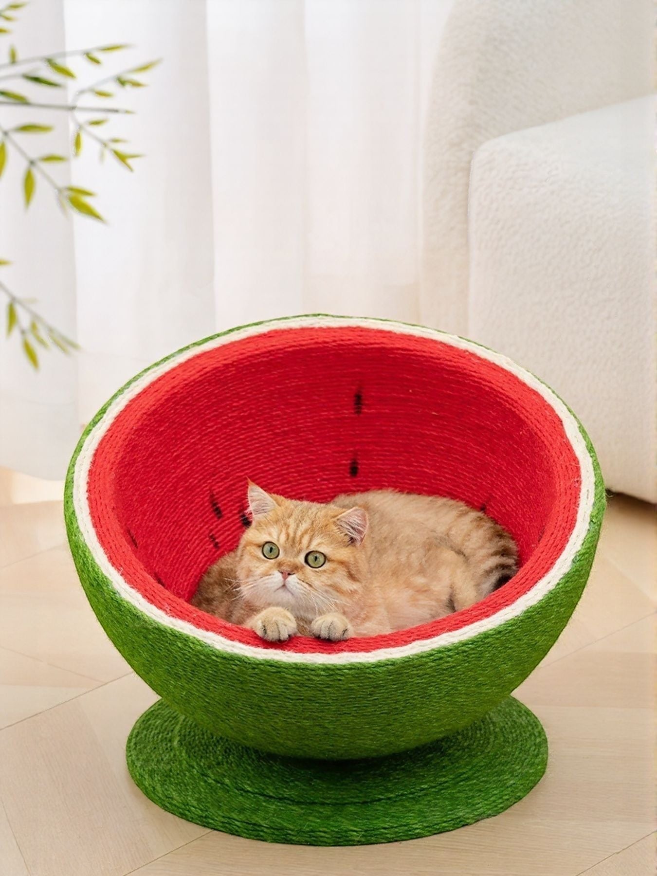 little pets club Watermelon shaped cat scratching post nest made of sisal rope, featuring a red interior and green exterior.