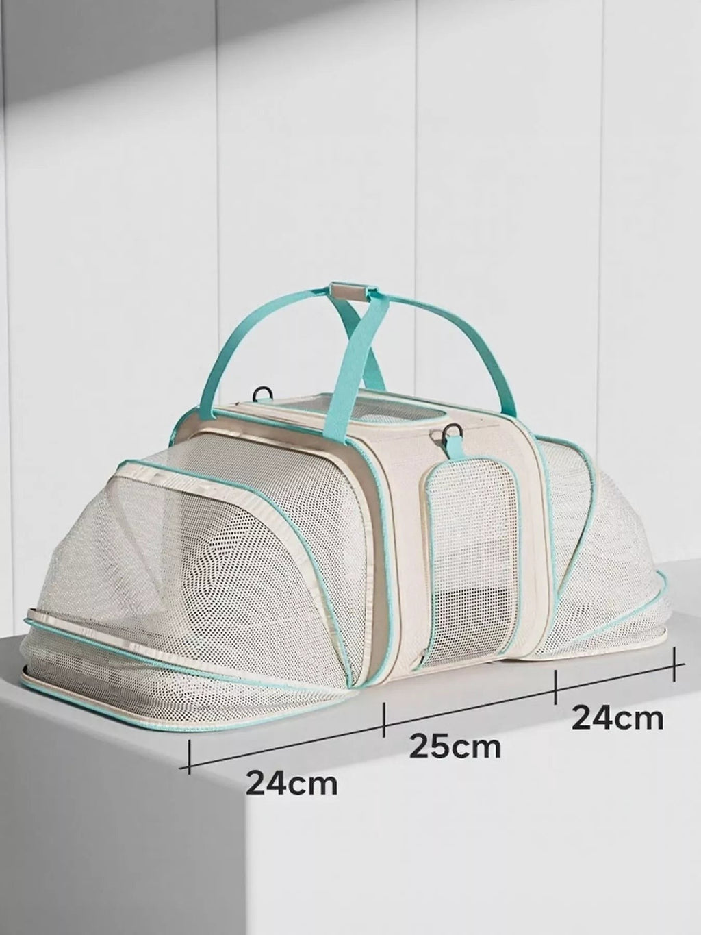 Little Pets Club beige and teal wheeled pet carrier with mesh viewing windows and top handles.