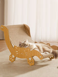 Little Pets Club wooden cat hammock with sisal scratcher, featuring a cute cat face cutout and paw print legs. A fluffy cat sleeps peacefully on the elevated bed.