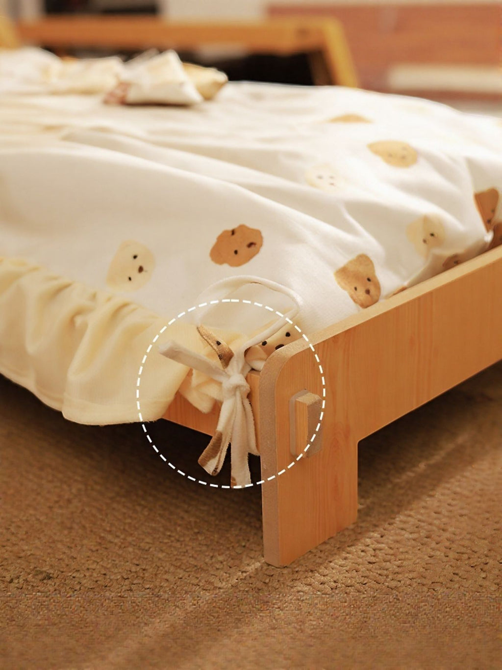 Little Pets Club wooden pet bed with white bedding featuring a cute teddy bear print and ruffled trim.