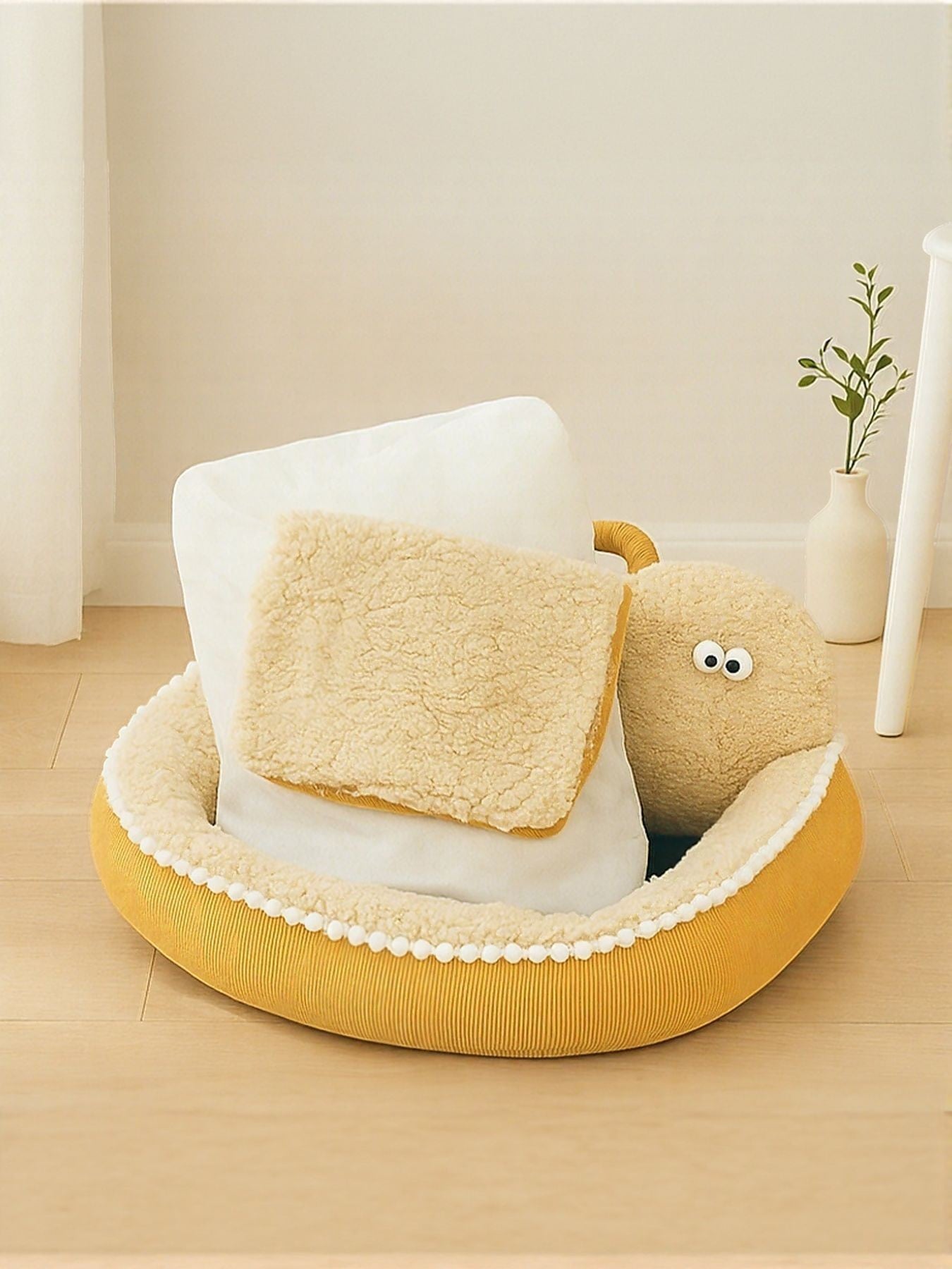 Little Pets Club yellow plush orthopedic pet sofa bed with raised edges and deep cushioned base.