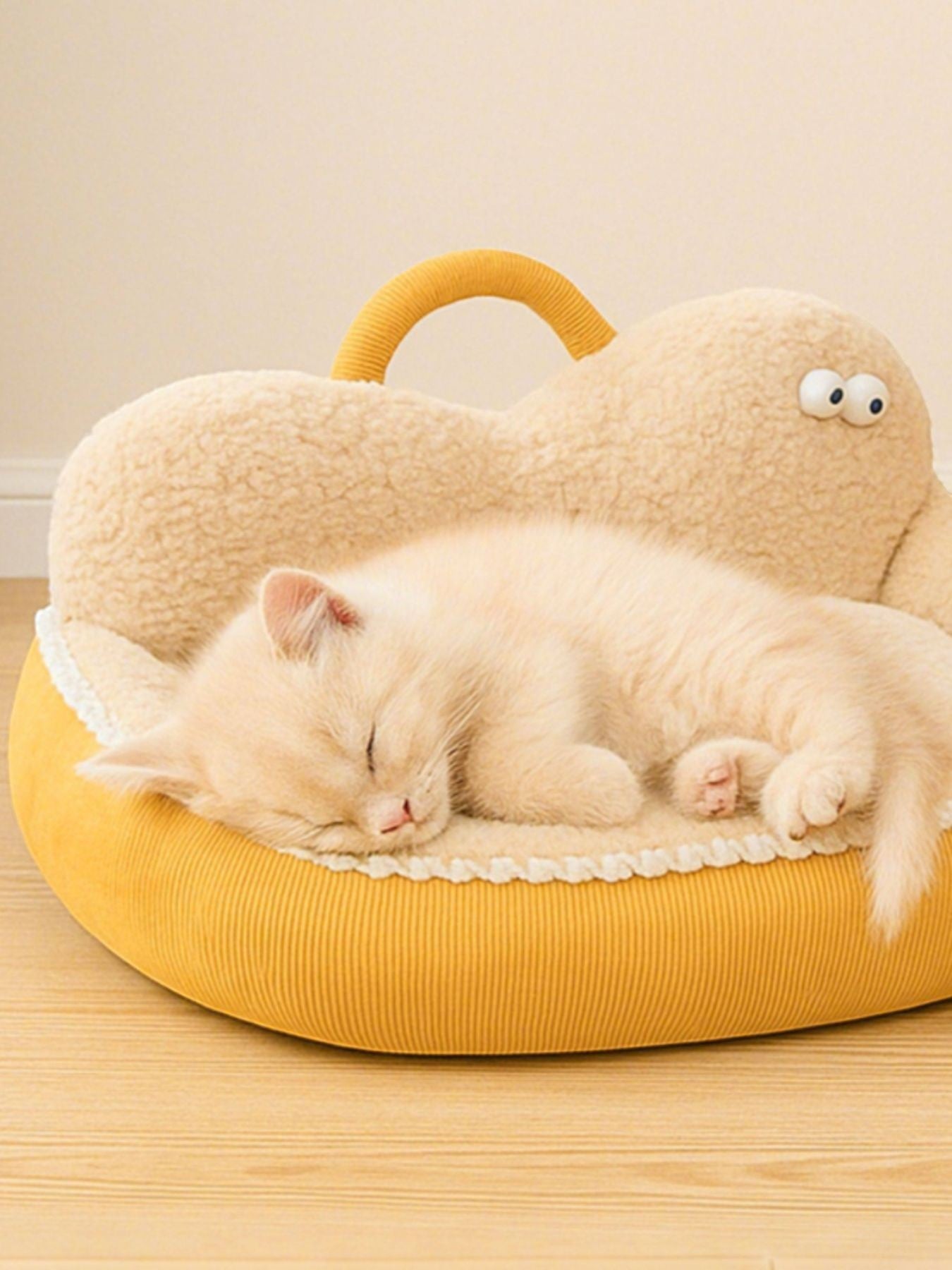 Little Pets Club yellow plush orthopedic pet sofa bed with raised edges, featuring a sleeping kitten.