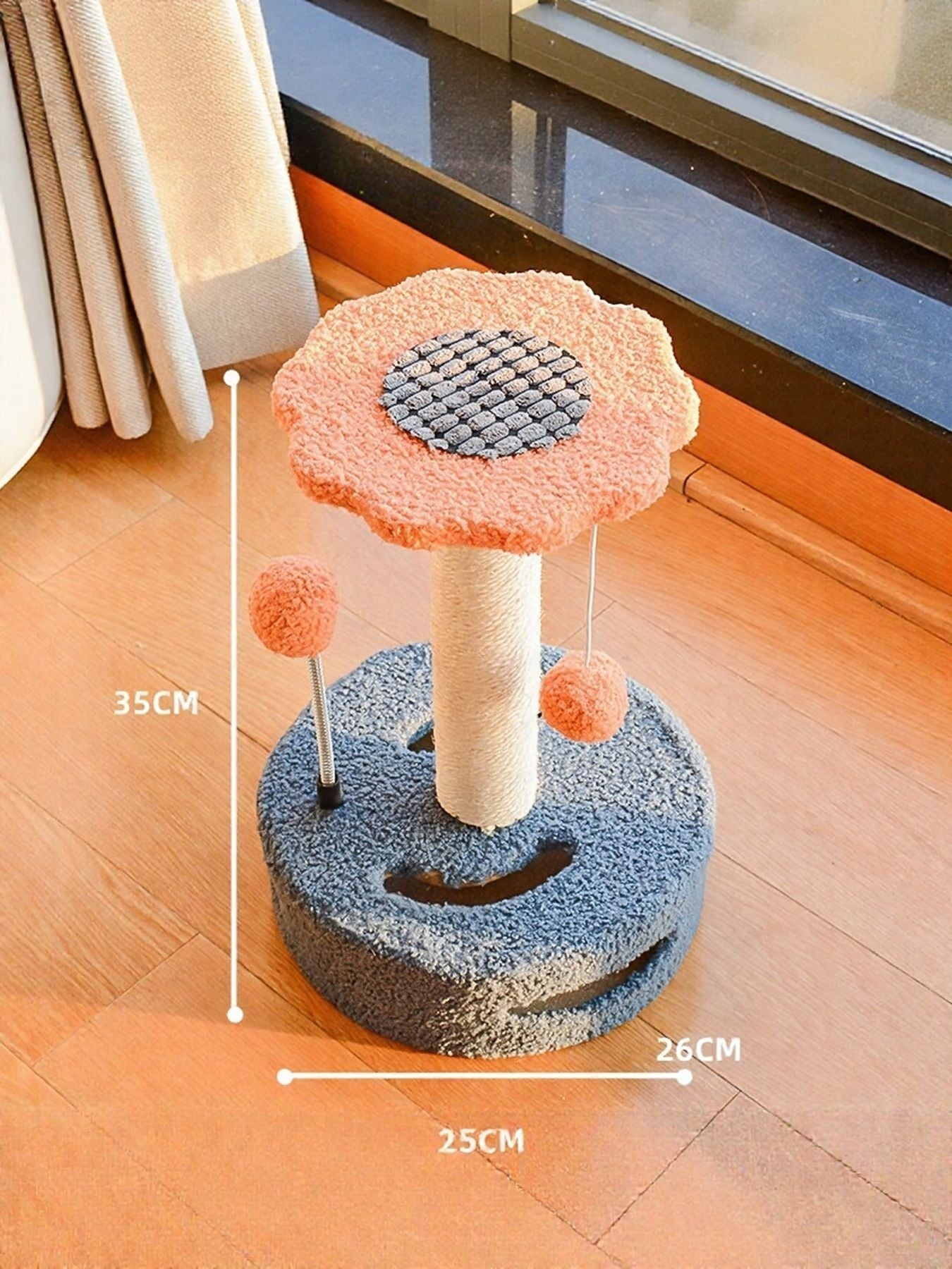 Little Pets Club Bloom Cat Scratcher with flower top, sisal post, and dangling pom balls. Blue textured base.