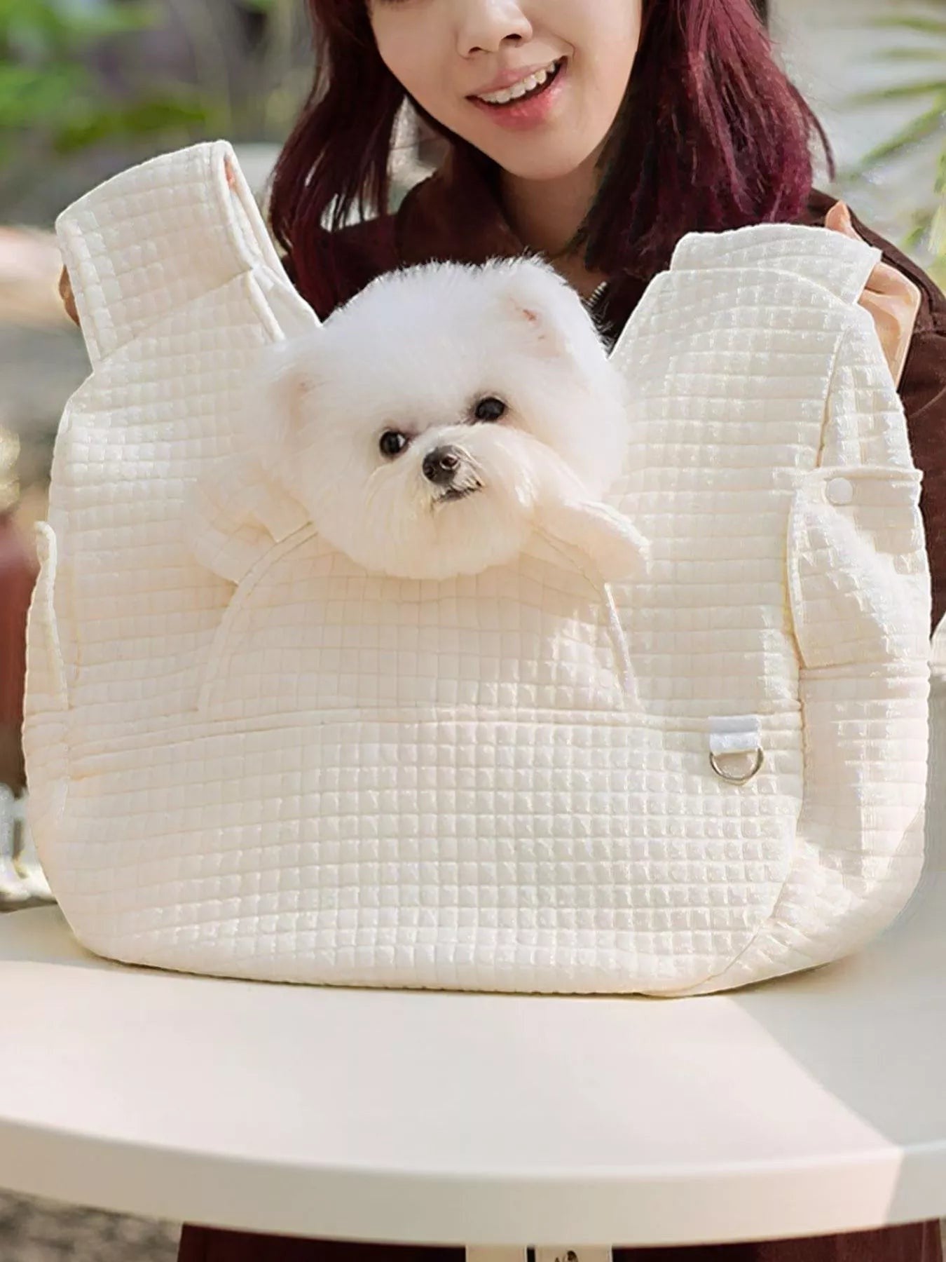 Little Pets Club cream quilted pet carrier tote bag with a small white dog peeking out.