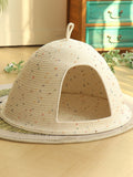 Little Pets Club Cozy Hideaway Cave pet bed, a cream woven dome with colorful speckles and an arched entrance.