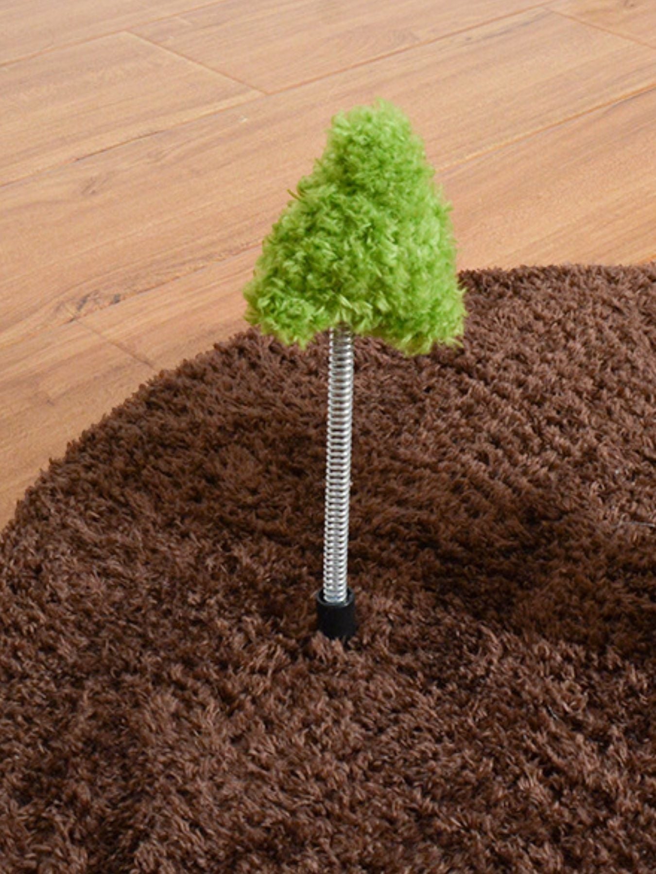 Little Pets Club green plush cat tree perch with metal spring and brown carpet base.