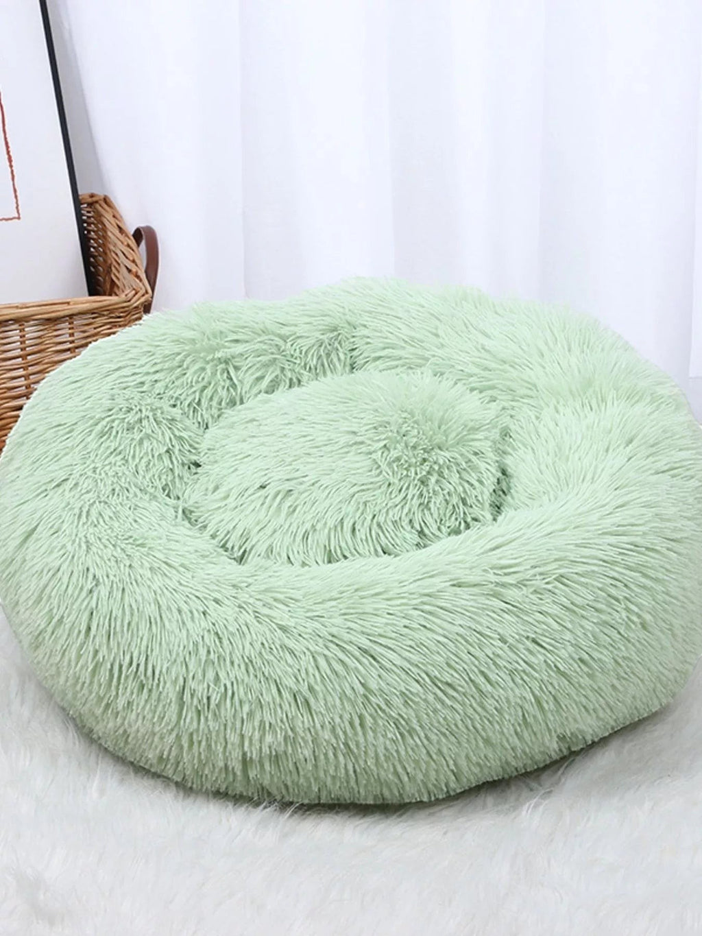Little Pets Club light green plush donut pet bed with raised edges for comfort and security, anti-anxiety design.
