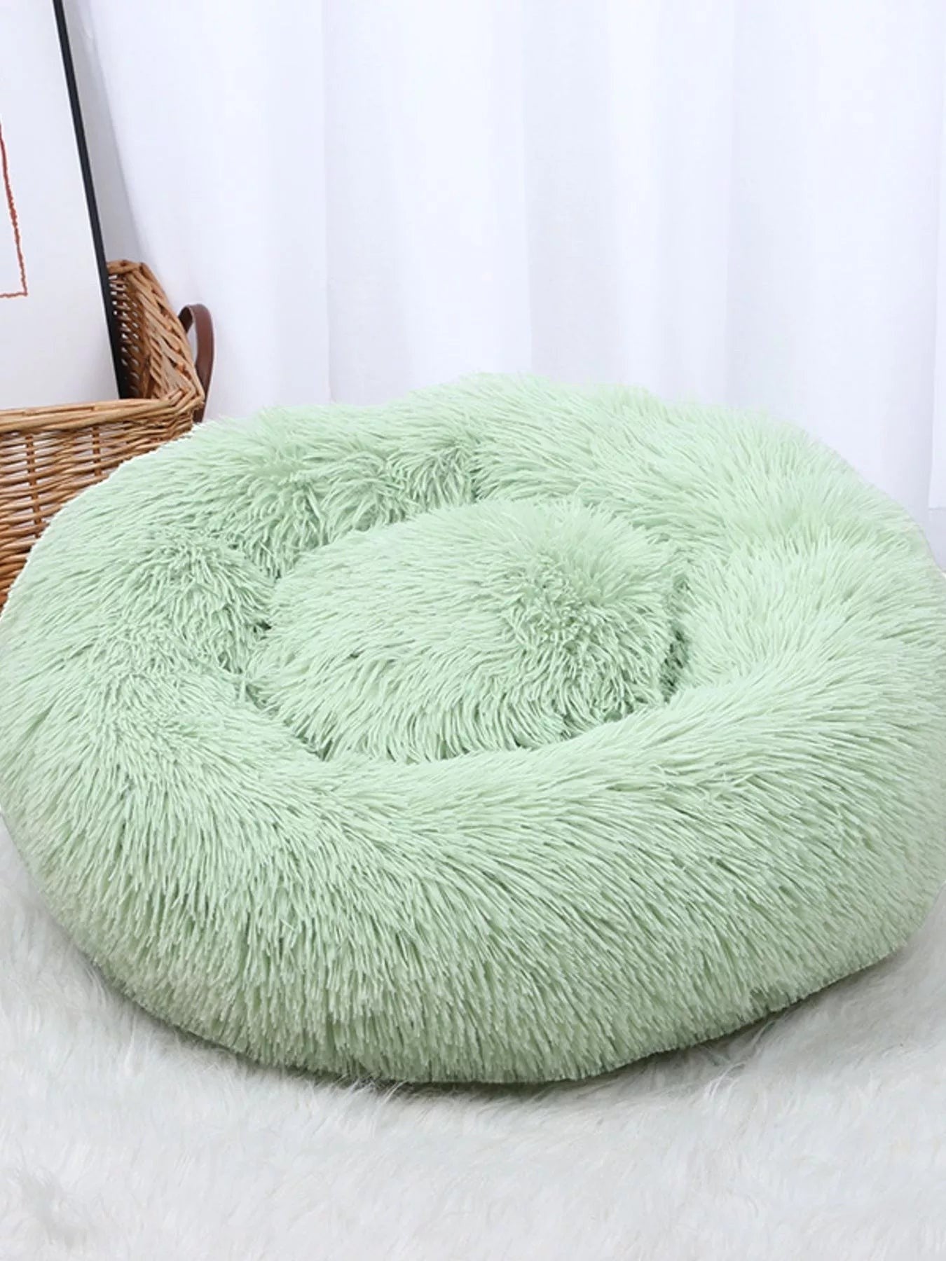 Little Pets Club light green plush donut pet bed with raised edges for comfort and security, anti-anxiety design.