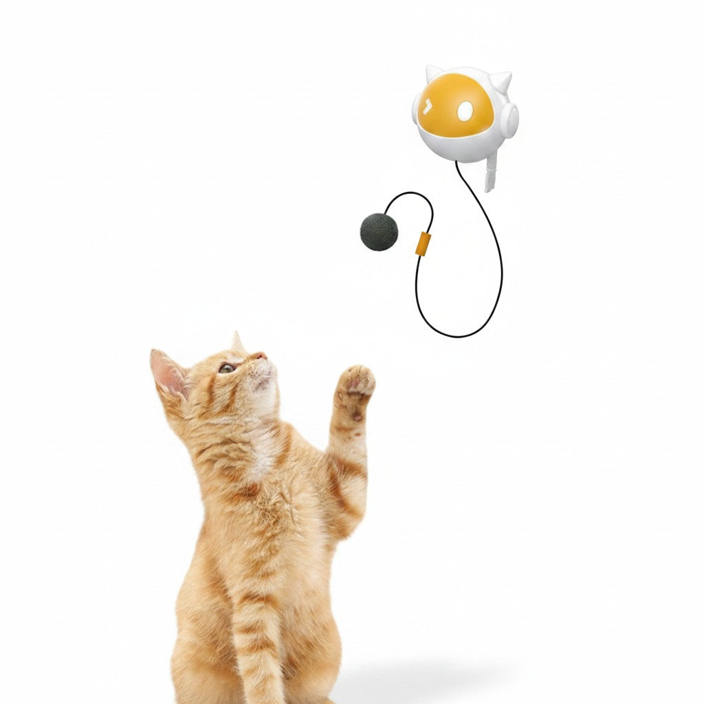 Little Pets Club interactive cat teaser toy with a white and yellow robot design, hanging from a table with a grey ball.