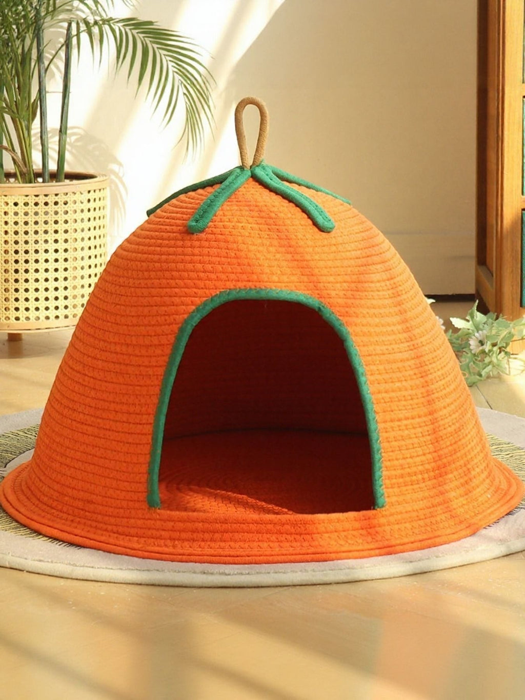 Little Pets Club orange woven pet cave bed with green trim and a top handle, perfect for cats and small dogs.