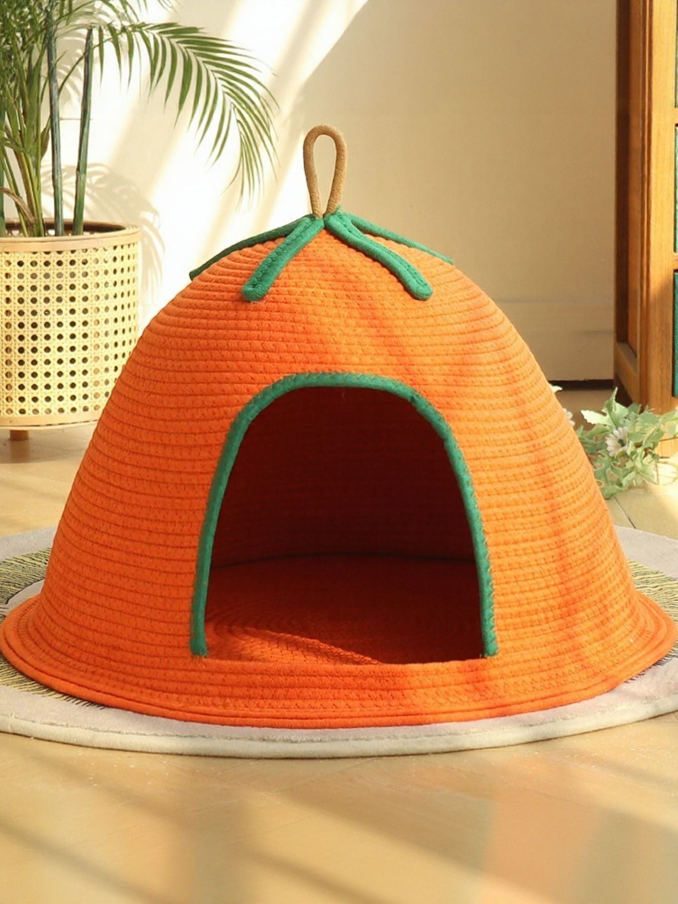 Little Pets Club orange woven pet cave bed with green trim and a top handle, perfect for cats and small dogs.