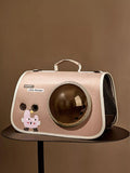 Little Pets Club pink pet carrier with bubble window and cute monster graphic. Features mesh sides for ventilation and a comfortable handle.