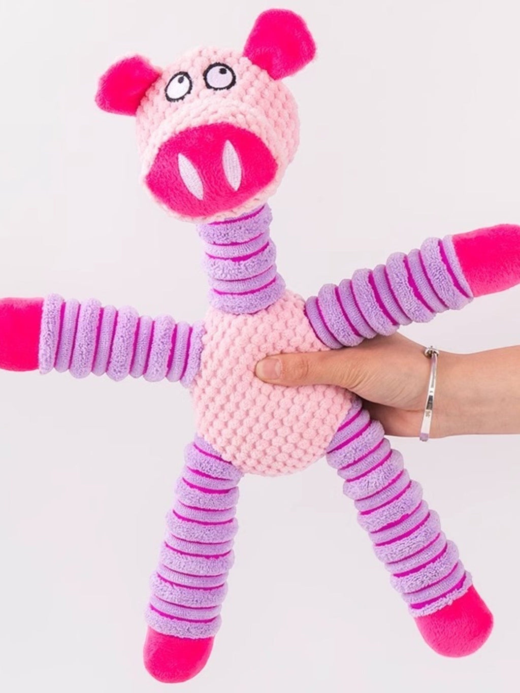 Little Pets Club pink plush pig dog toy with purple striped limbs and squeaker