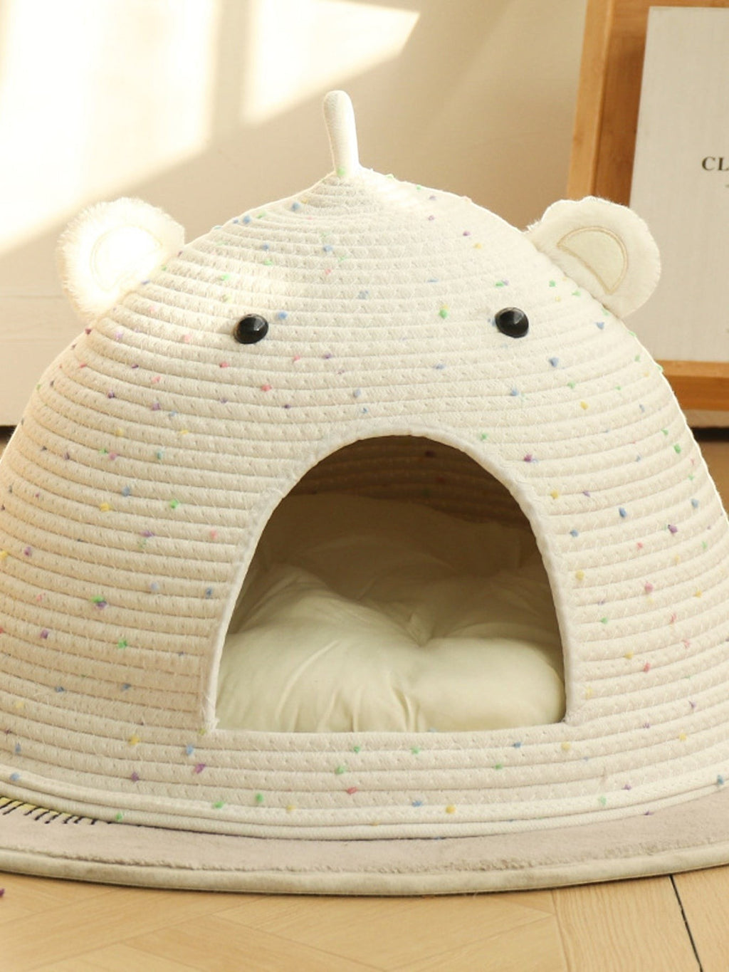 Little Pets Club speckled bear ear cat cave bed made of cotton rope with a soft cushion inside.