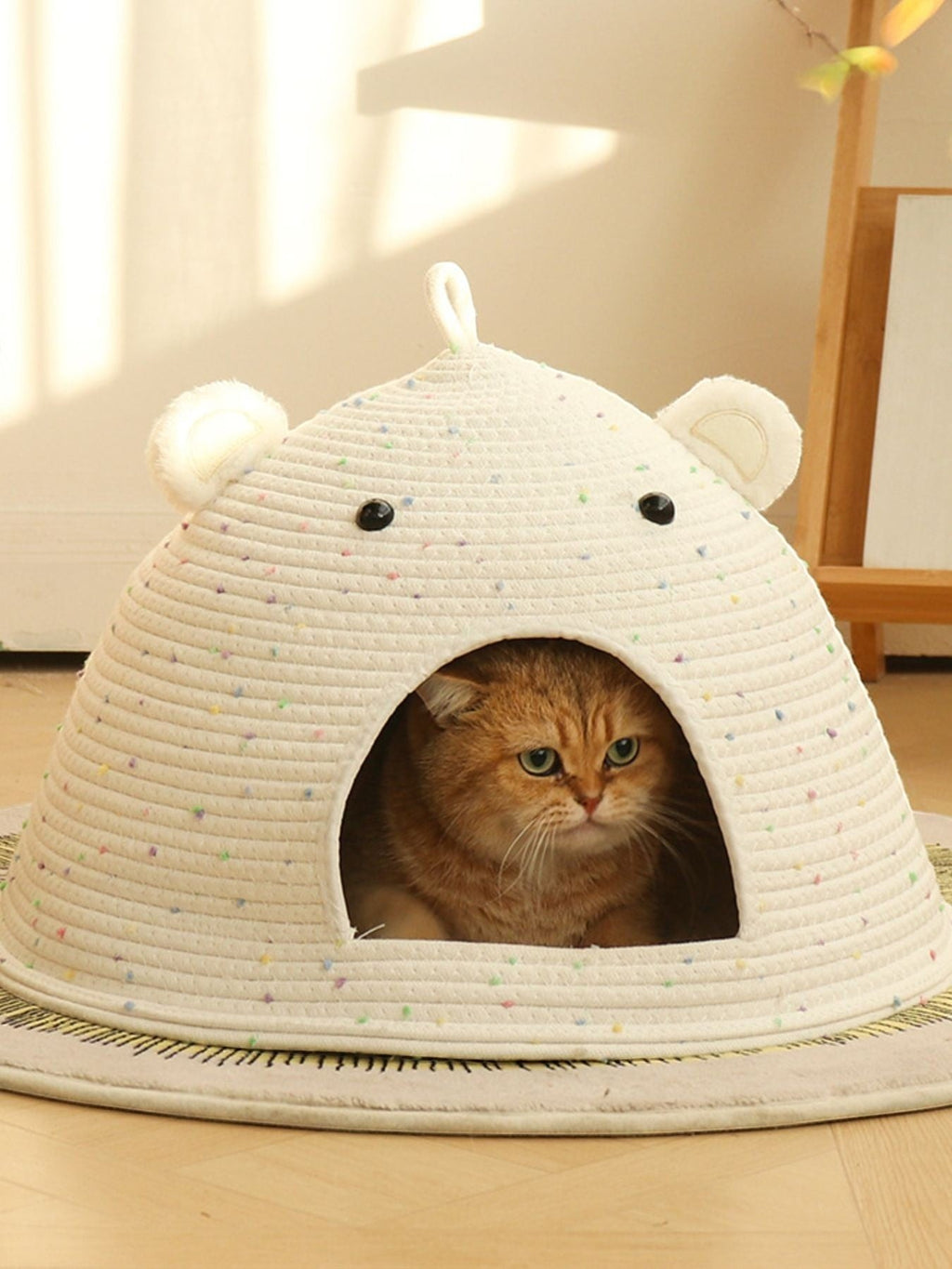 Little Pets Club Speckled Bear Ear Cat Cave Bed, a cozy, dome-shaped cat bed made of cotton rope with multicolor speckles and bear ears.