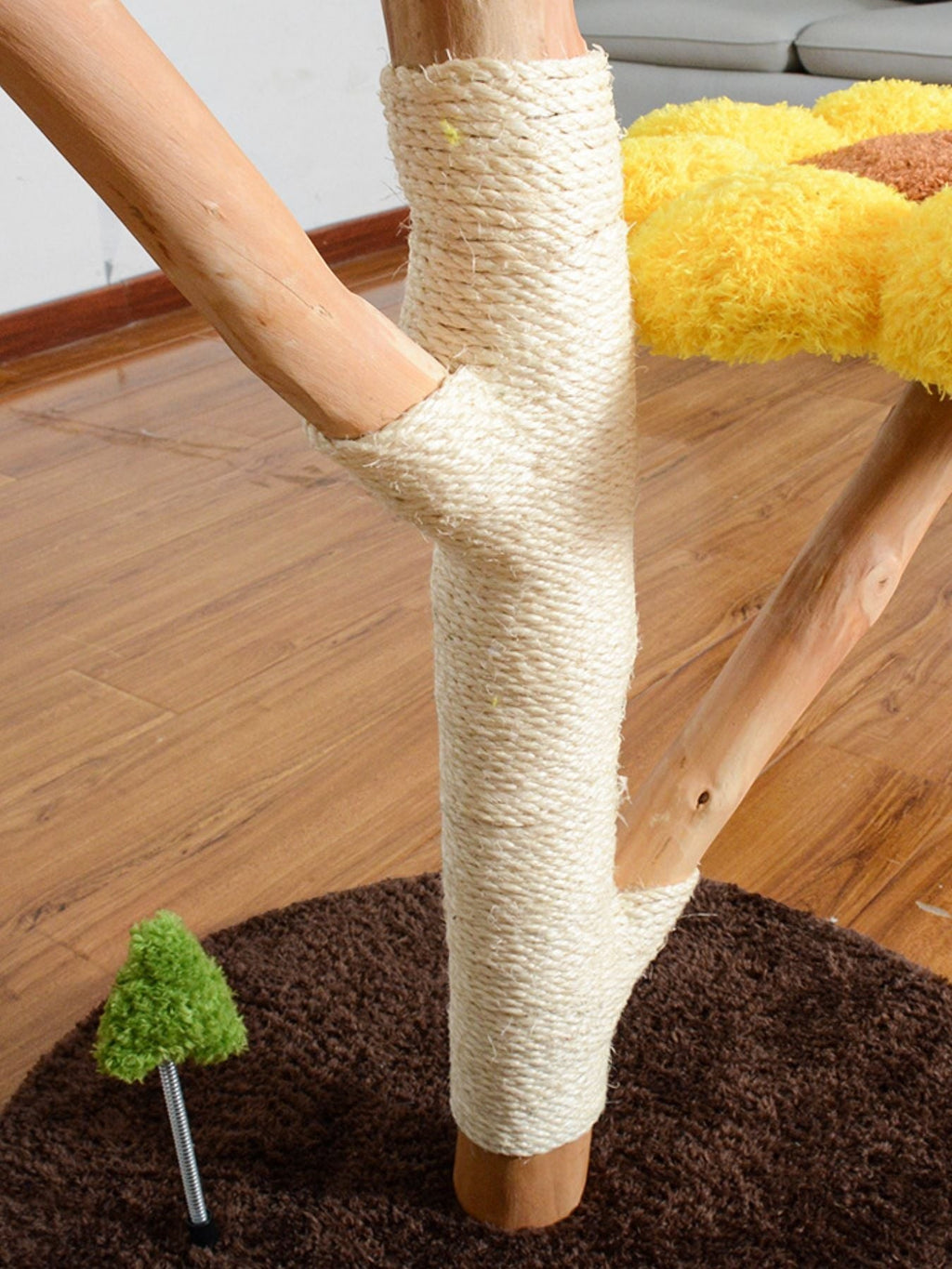 Little Pets Club Sunflower Cat Tree with natural wood, sisal-wrapped posts, and plush yellow flower perch.