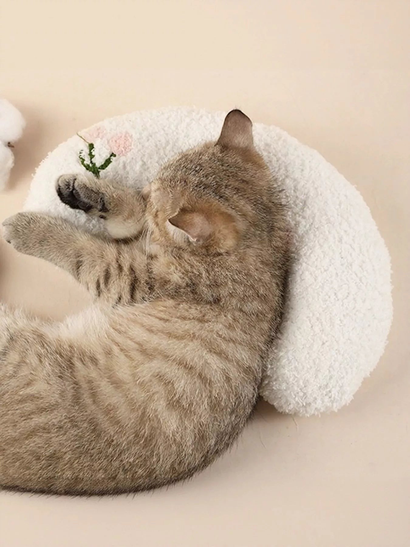 Little Pets Club white U-shaped plush pet nest with embroidered pink flowers, perfect for cats and small dogs.